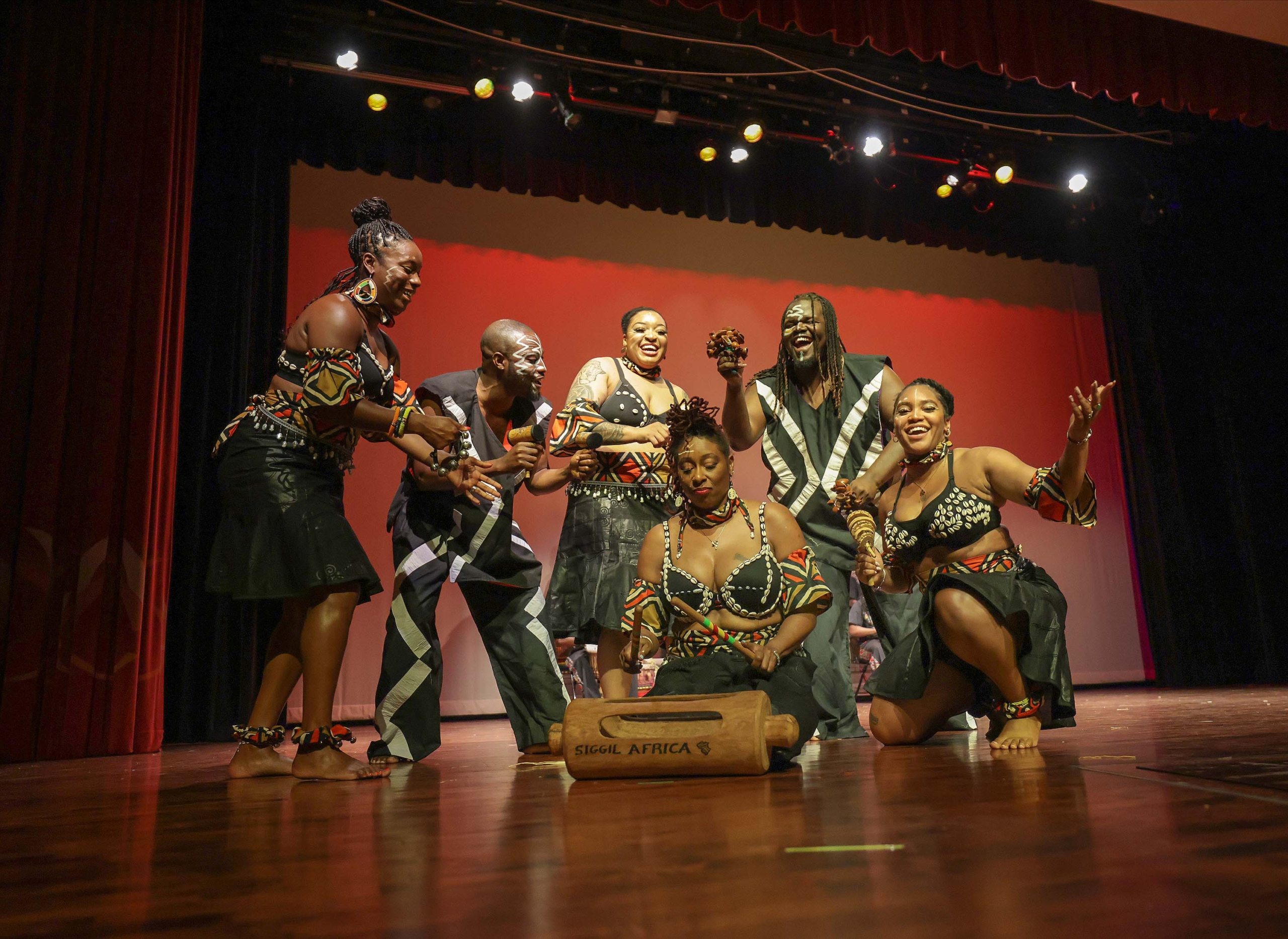 Members of Thiossane Institute gathered with instruments.